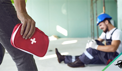 Man bringing first aid pack to injured construction worker