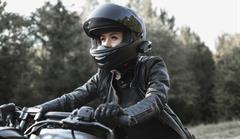 Lady riding motorcycle
