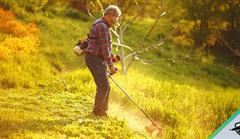 Man using Weed Wacker on long grass