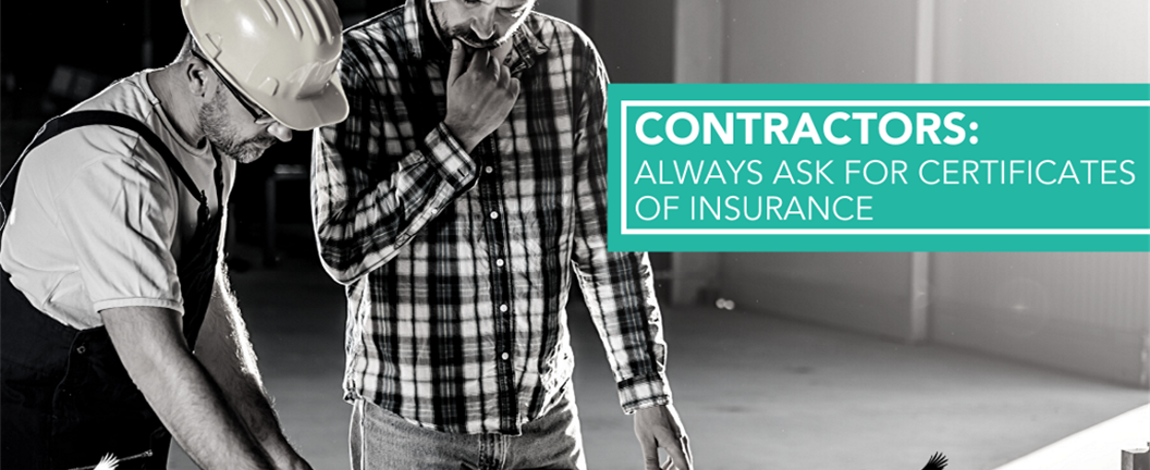 Two contractors reviewing plans