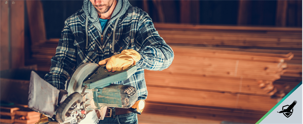 Contractor using saw