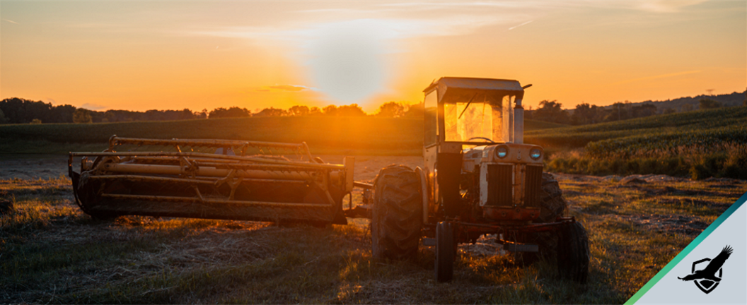 Farmer driving tractor