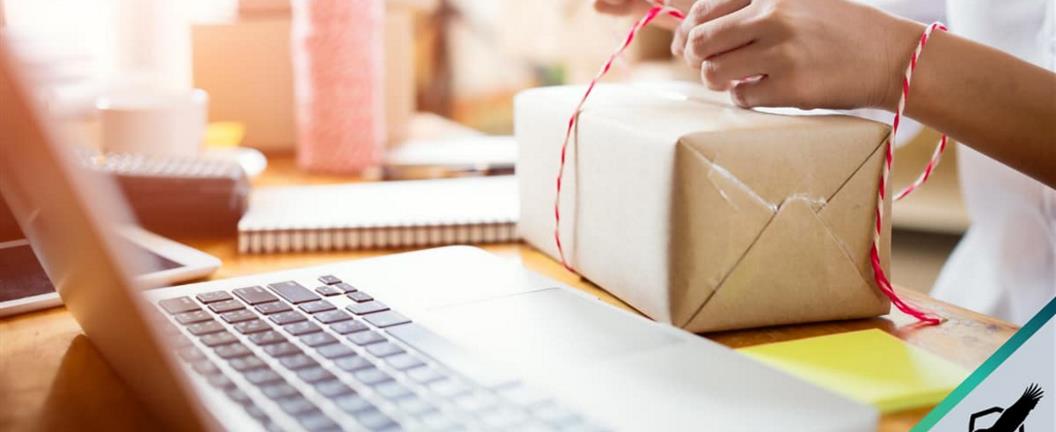 Lady wrapping a package in her home